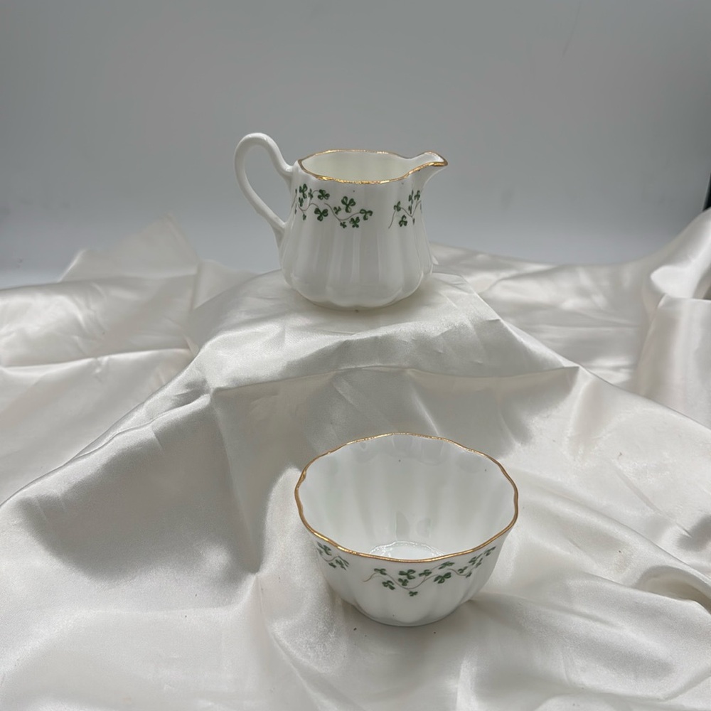Elegant White and Green Porcelain Creamer and Sugar Bowl Set